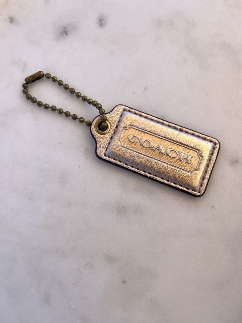 COACH Vintage Metallic Leather Hang Tag, Light Gold - Picture 2 of 3